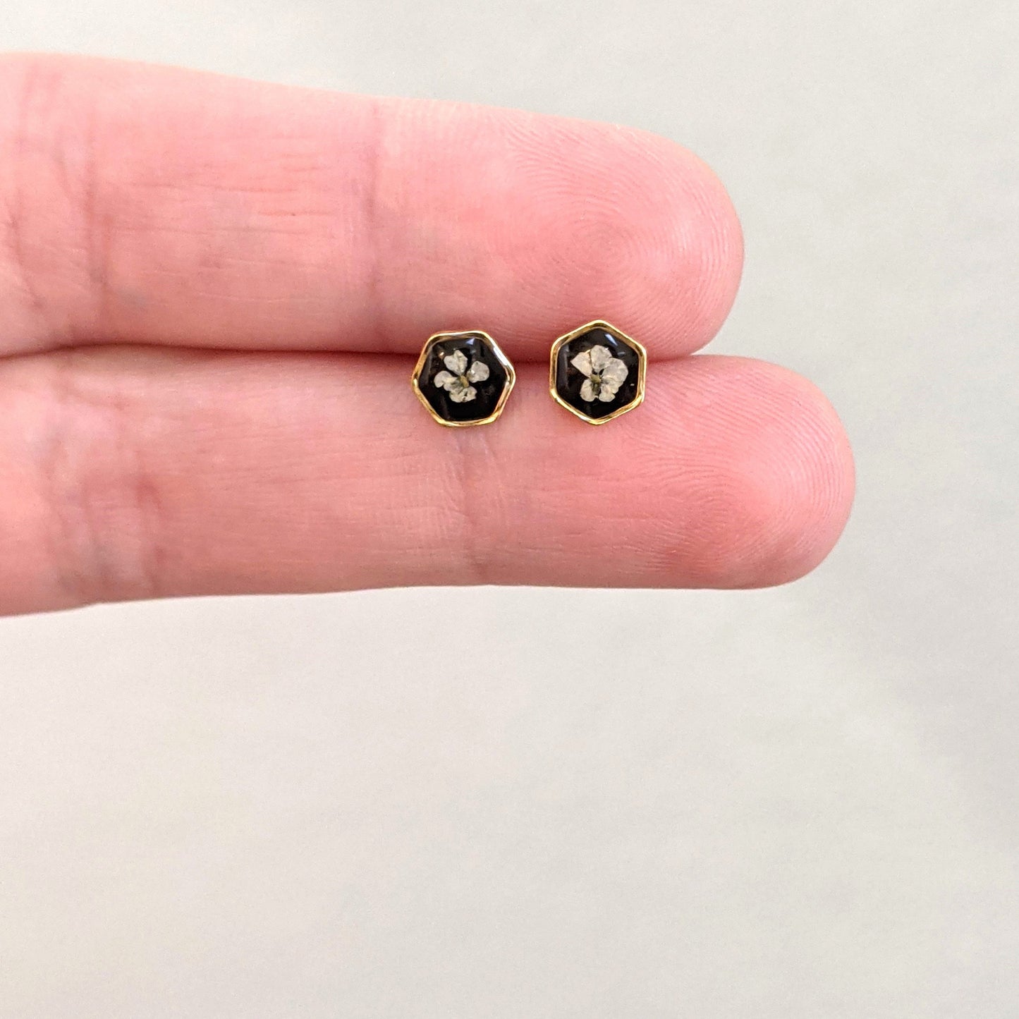 Tiny real pressed flower earrings, Gold hexagons, white, black, minimalist studs, pressed flowers, titanium posts, handmade resin jewelry