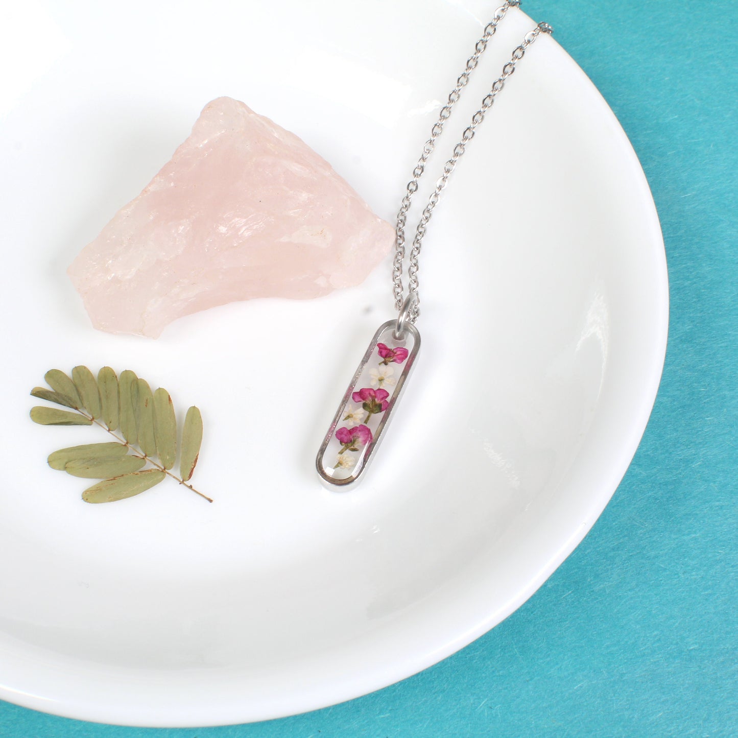 Dainty Pressed Flower Necklace, Oval Silver Bar, Real Dark Pink Dried Wildflowers, Resin, Pill Shaped Small Nature Pendant, Plant Jewelry