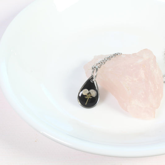 Silver pressed flower necklace, dainty handmade resin wildflower pendant, small teardrop black, white natural botanical jewelry, nature gift
