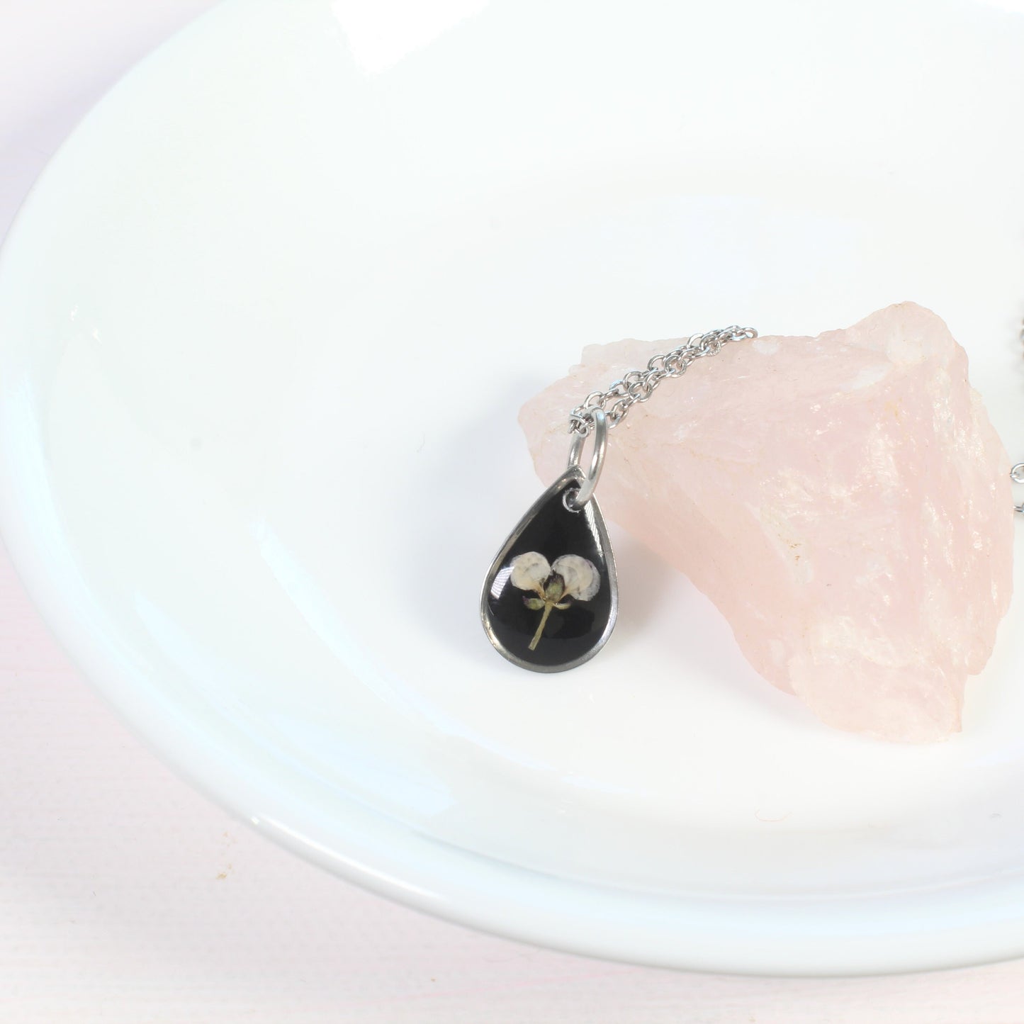 Tiny gold pressed flower necklace, natural white flower, handmade resin pendant, black, botanical jewelry, small, dainty, wildflower, plant