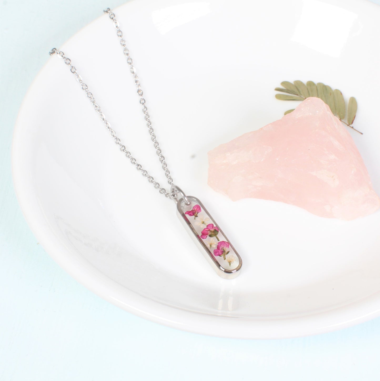 Dainty Pressed Flower Necklace, Oval Silver Bar, Real Dark Pink Dried Wildflowers, Resin, Pill Shaped Small Nature Pendant, Plant Jewelry