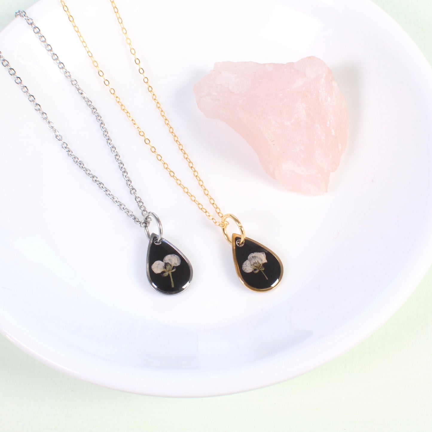 Tiny gold pressed flower necklace, natural white flower, handmade resin pendant, black, botanical jewelry, small, dainty, wildflower, plant