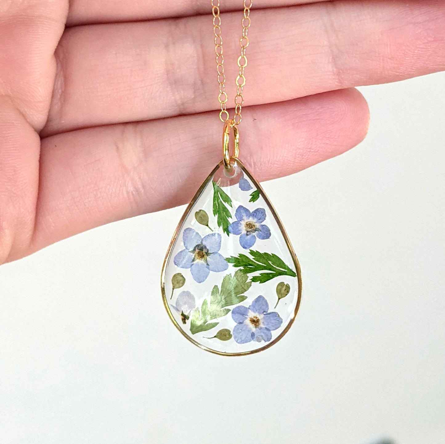 Pressed forget me not flowers and fern leaves resin handmade teardrop necklace