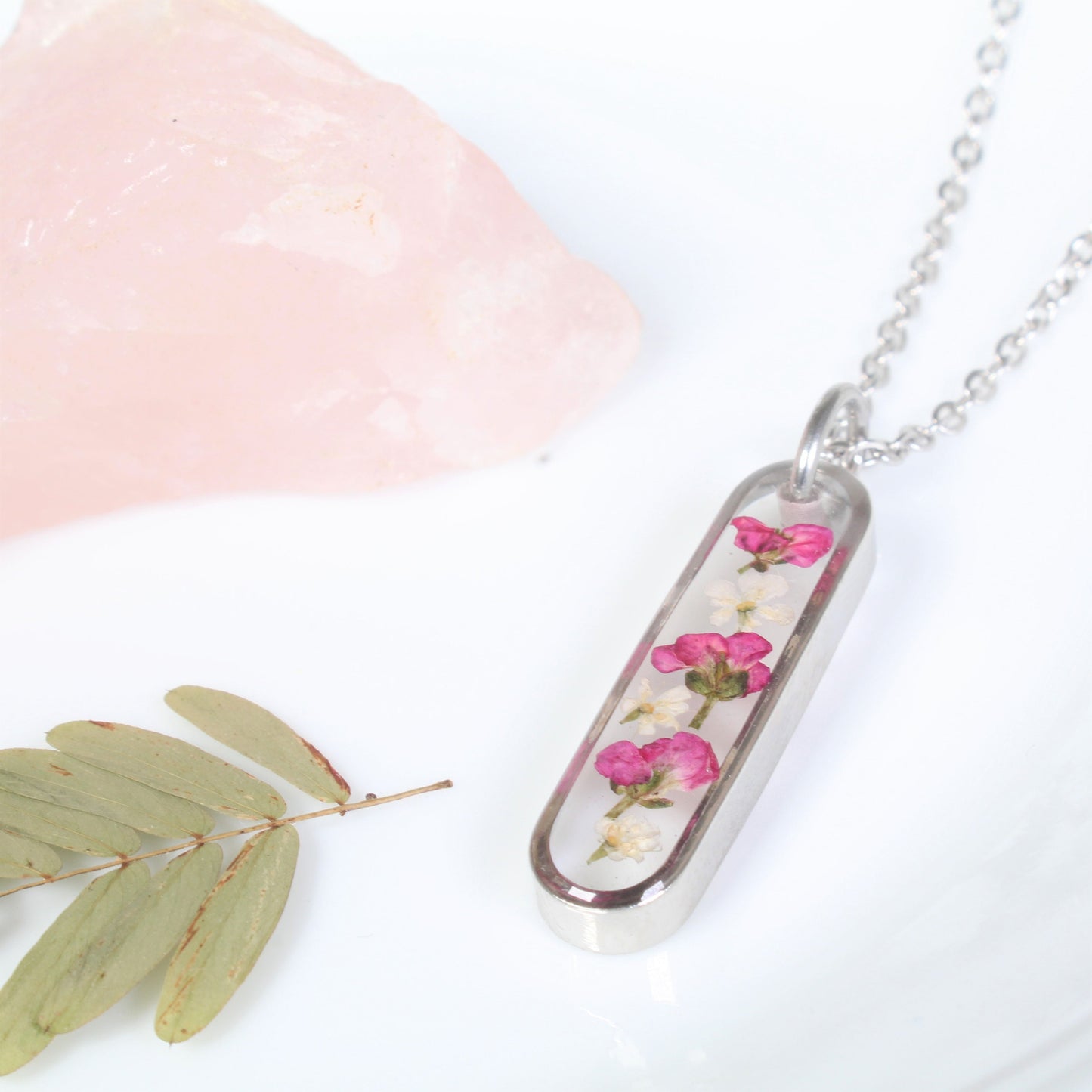 Dainty Pressed Flower Necklace, Oval Silver Bar, Real Dark Pink Dried Wildflowers, Resin, Pill Shaped Small Nature Pendant, Plant Jewelry