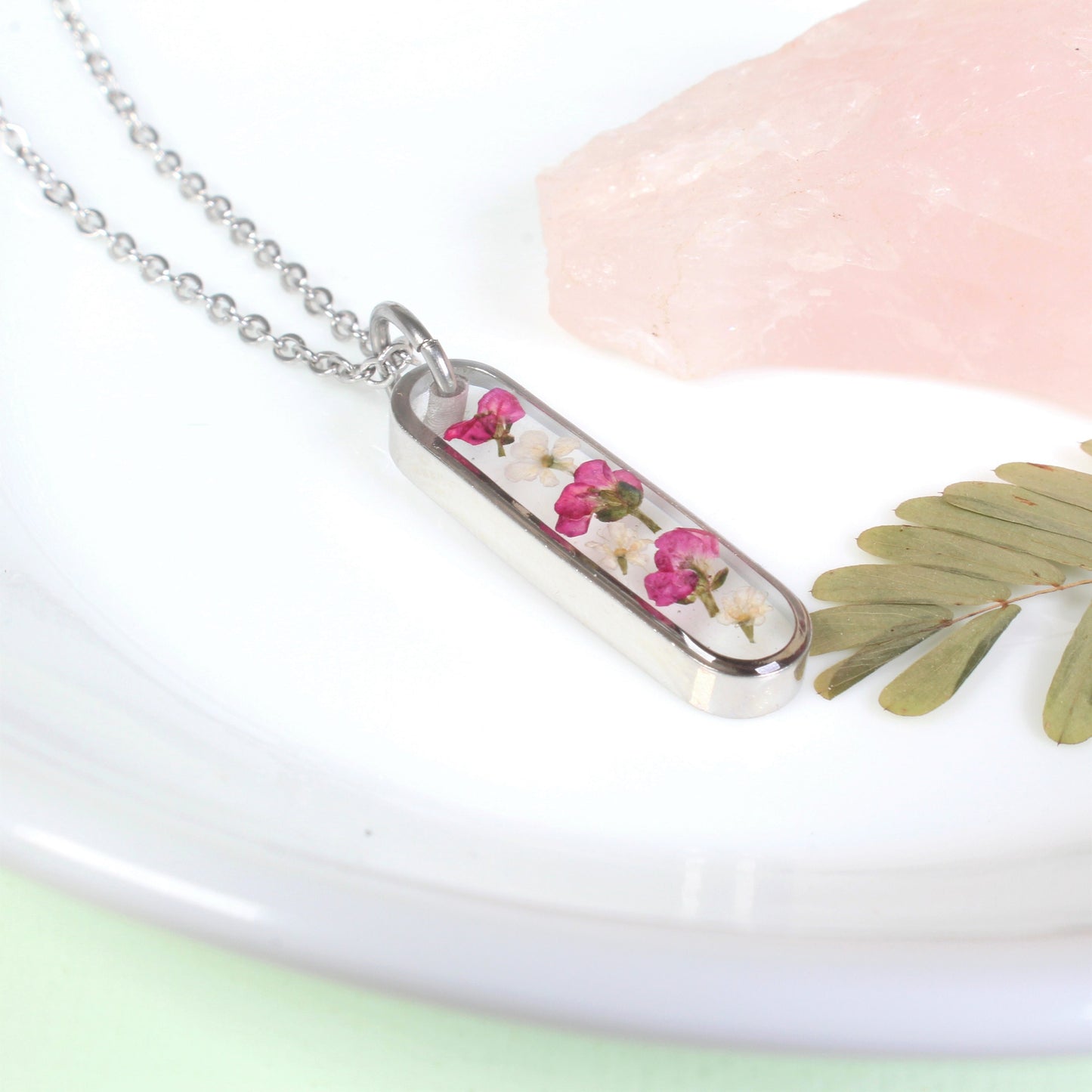 Dainty Pressed Flower Necklace, Oval Silver Bar, Real Dark Pink Dried Wildflowers, Resin, Pill Shaped Small Nature Pendant, Plant Jewelry